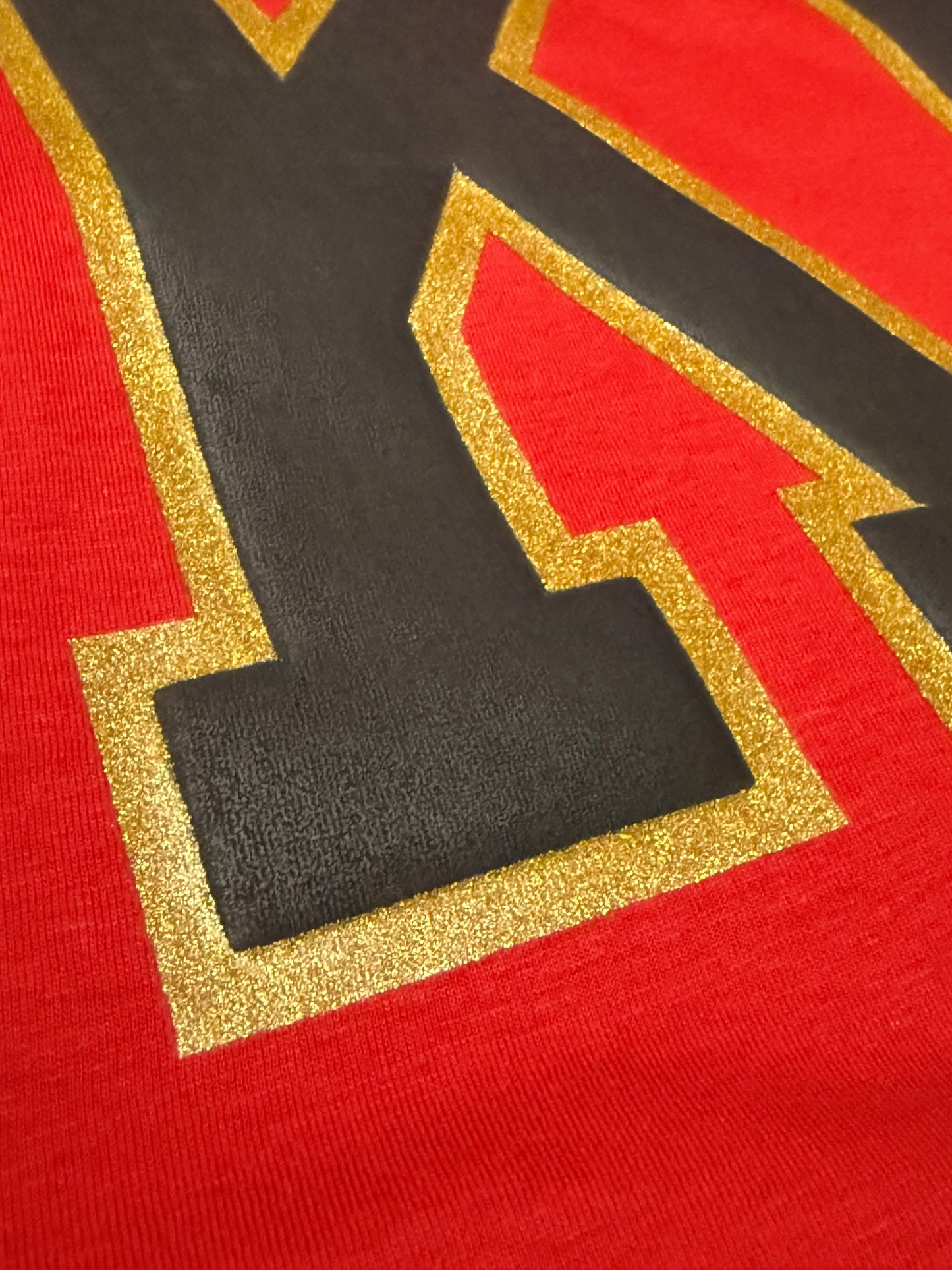 KC Varsity Puff Tee – Black with Metallic Gold Outline