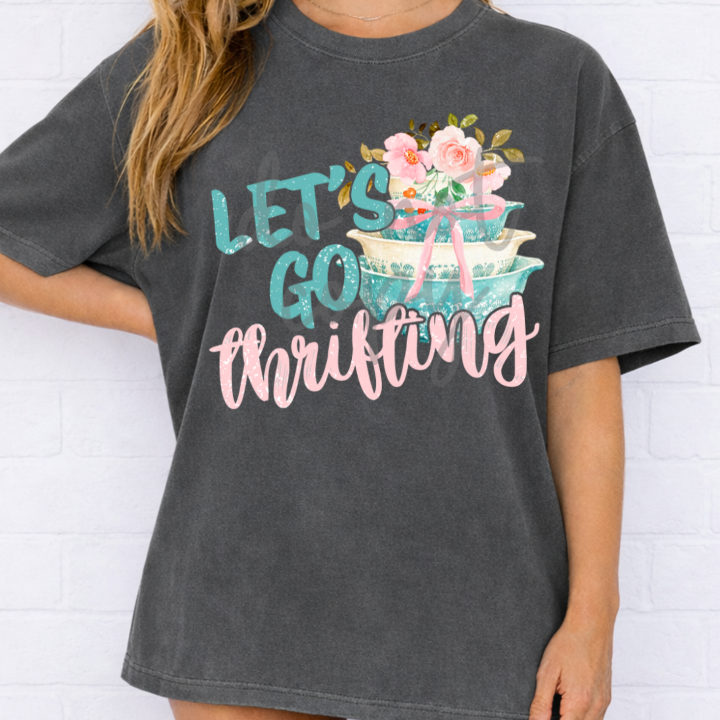 Let's Go Thrifting Comfort Colors® graphic tee featuring vintage floral bowls, pink bow accents, and retro thrift lover style.