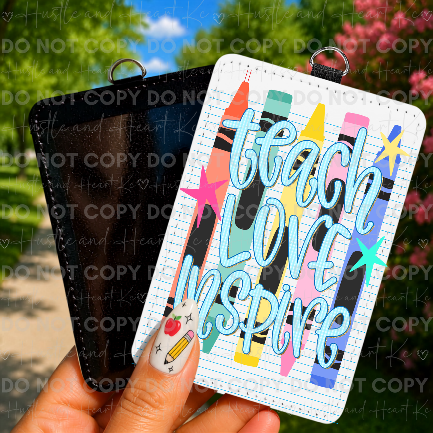 Teacher badge reel featuring Teach Love Inspire lettering with colorful crayons.