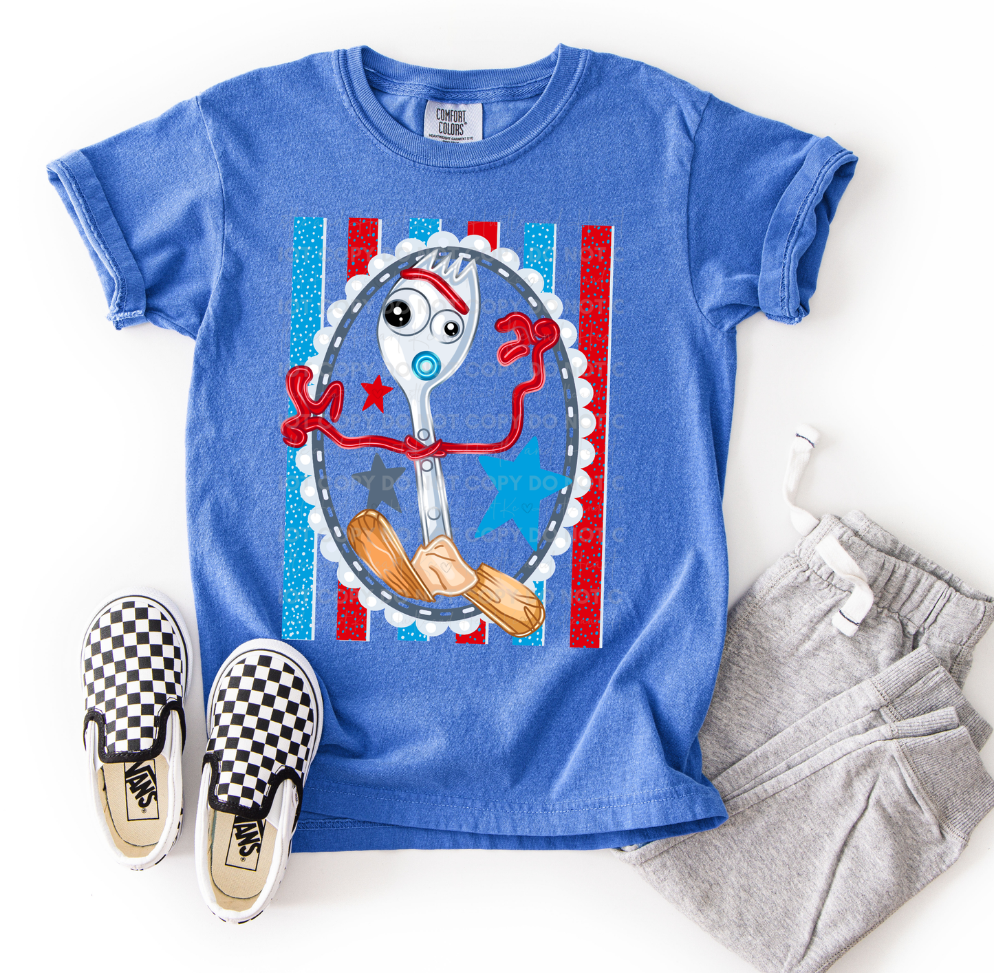 Forky-inspired character design printed on a Comfort Colors t-shirt featuring colorful stars, stripes, and playful details, perfect for Disney vacations, Toy Story fans, and family matching outfits.
