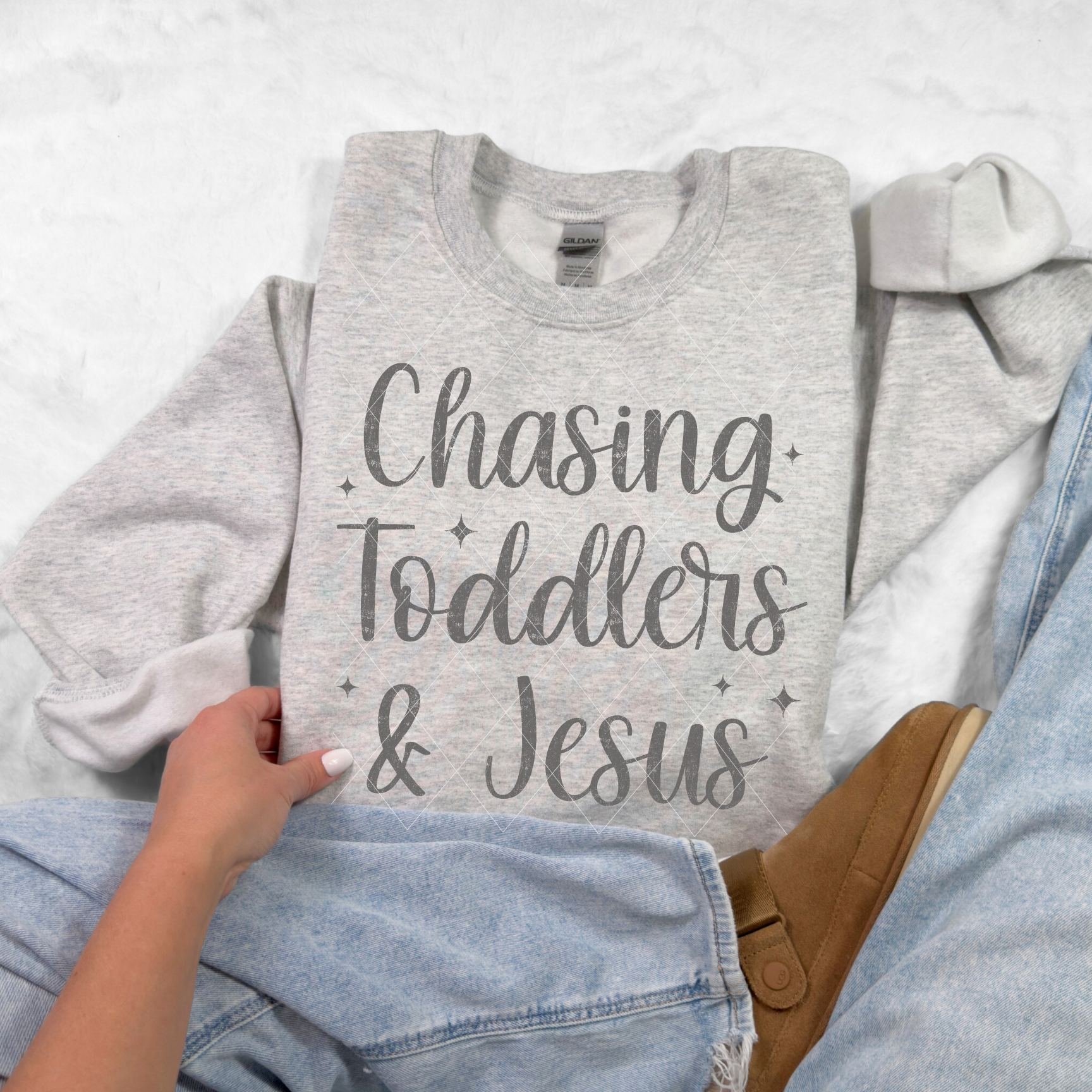 Chasing Toddlers & Jesus sweatshirt in Ash Gray — inspirational mom life crewneck styled with light-wash jeans