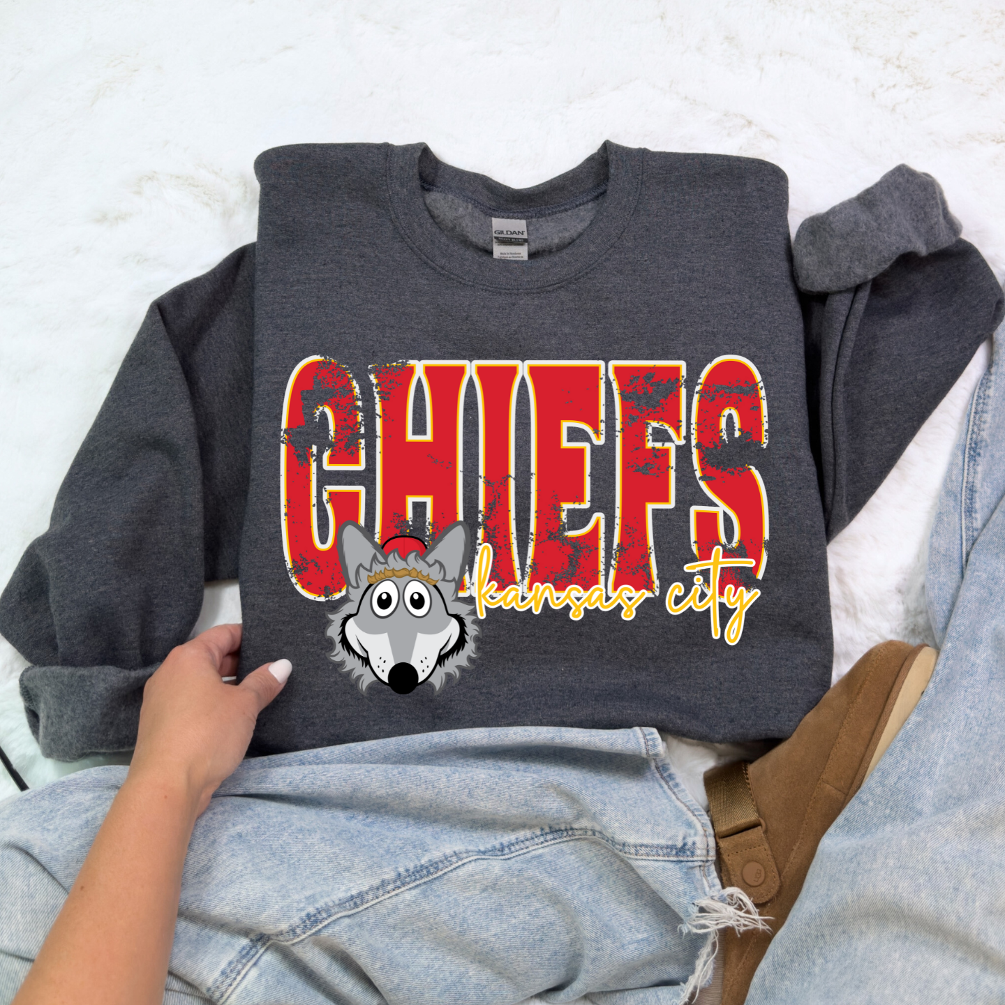 Youth Dark Heather Chiefs sweatshirt for kids with football mascot.