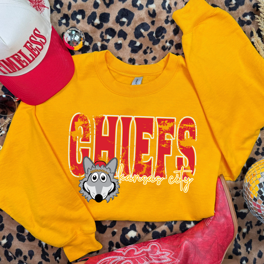 Youth Gold KC Chiefs sweatshirt with distressed lettering and Wolf print.
