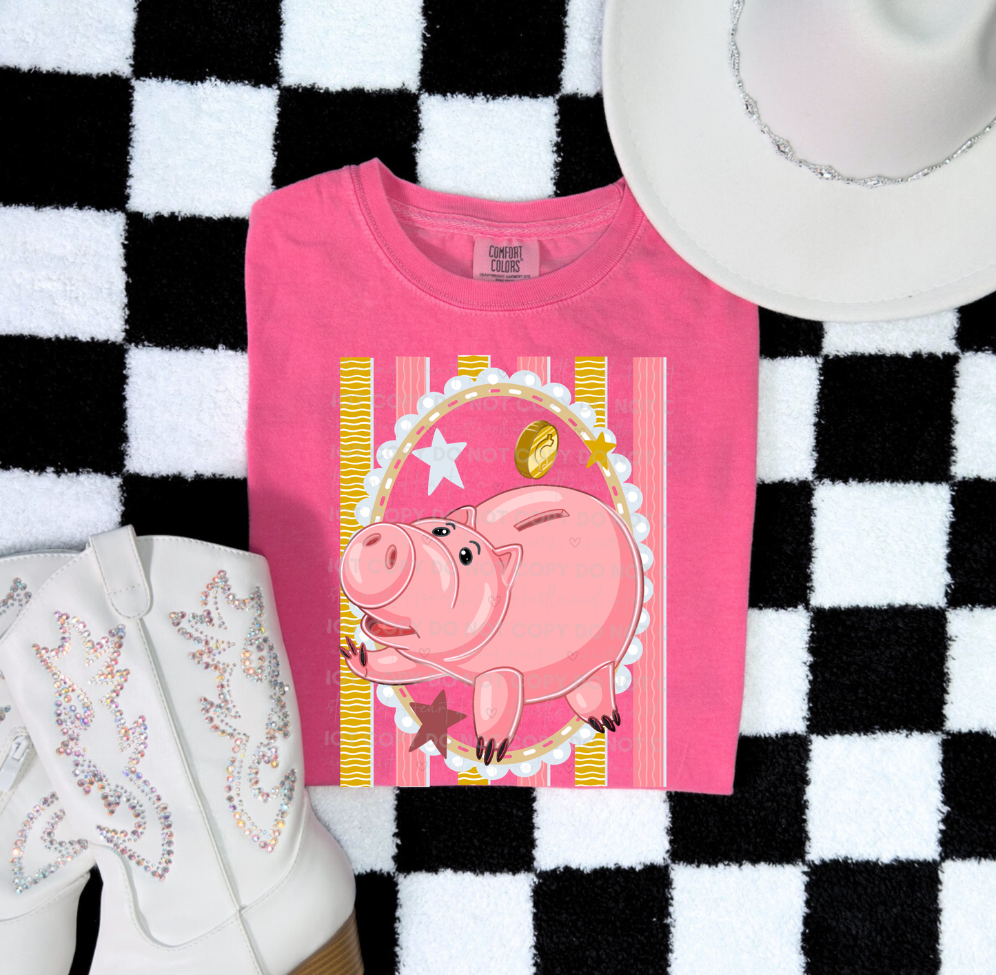 Hamm-inspired piggy bank character design on a Comfort Colors® t-shirt with colorful accents and playful details.