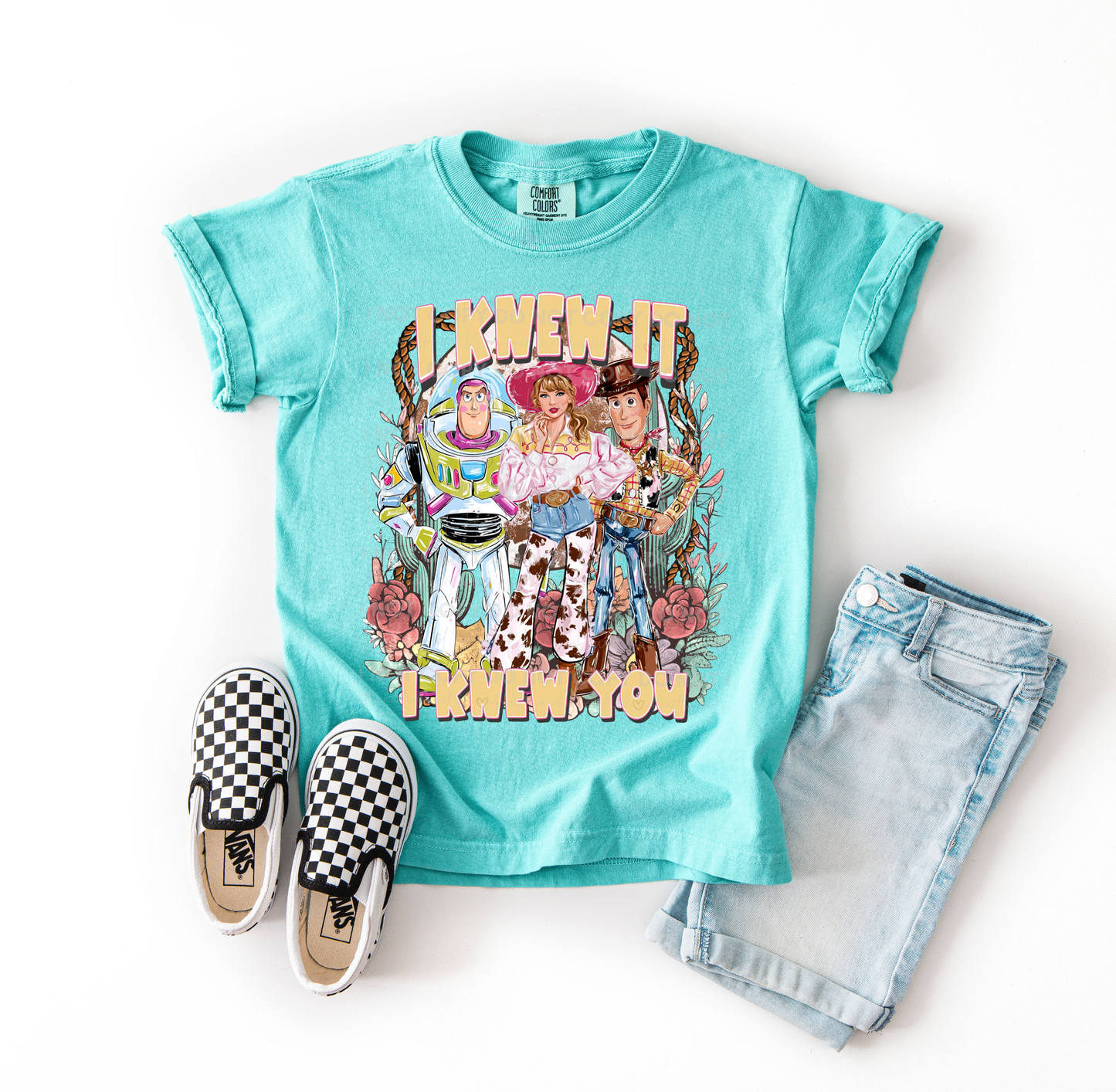 Bo Peep-inspired character design printed on a Comfort Colors t-shirt featuring pastel pink and blue colors, stars, stripes, and shepherd-inspired details, perfect for Disney vacations and Toy Story fans.