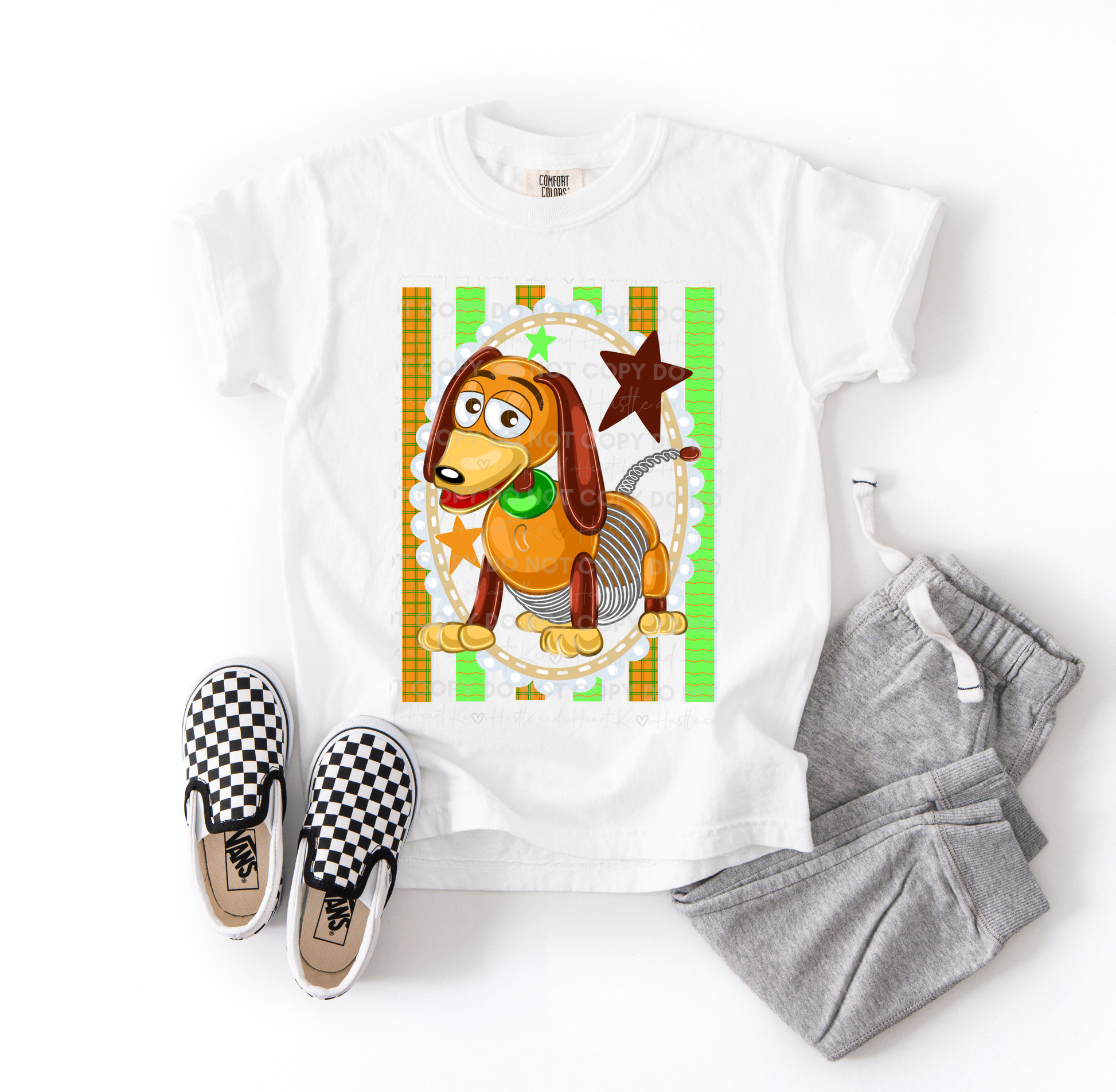 Slinky Dog-inspired character design printed on a Comfort Colors® t-shirt with playful toy-inspired details and colorful accents.