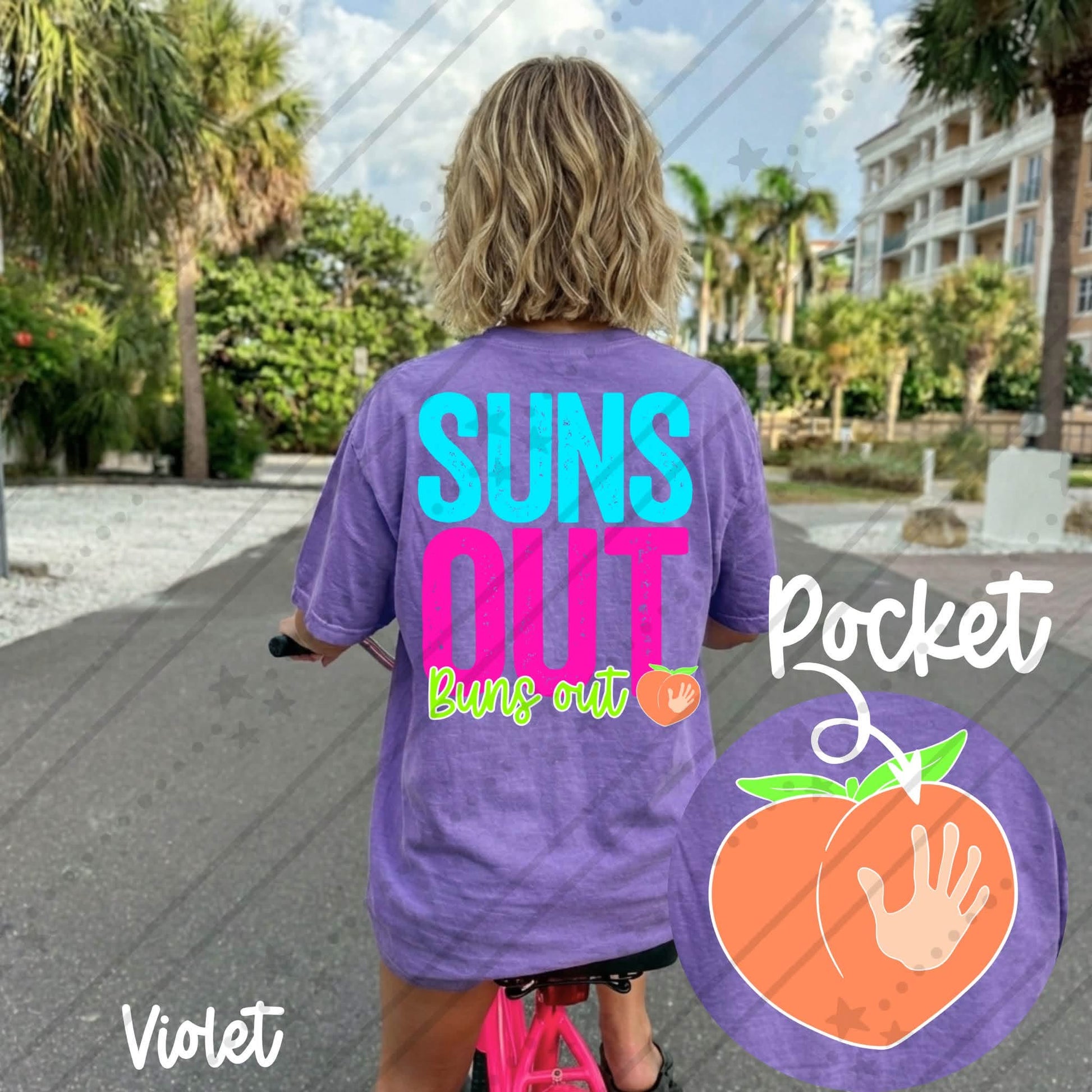 Comfort Colors violet graphic t-shirt featuring a colorful "Suns Out Buns Out" summer design on the back with a matching peach pocket graphic on the front, styled for beach vacations and summer travel.