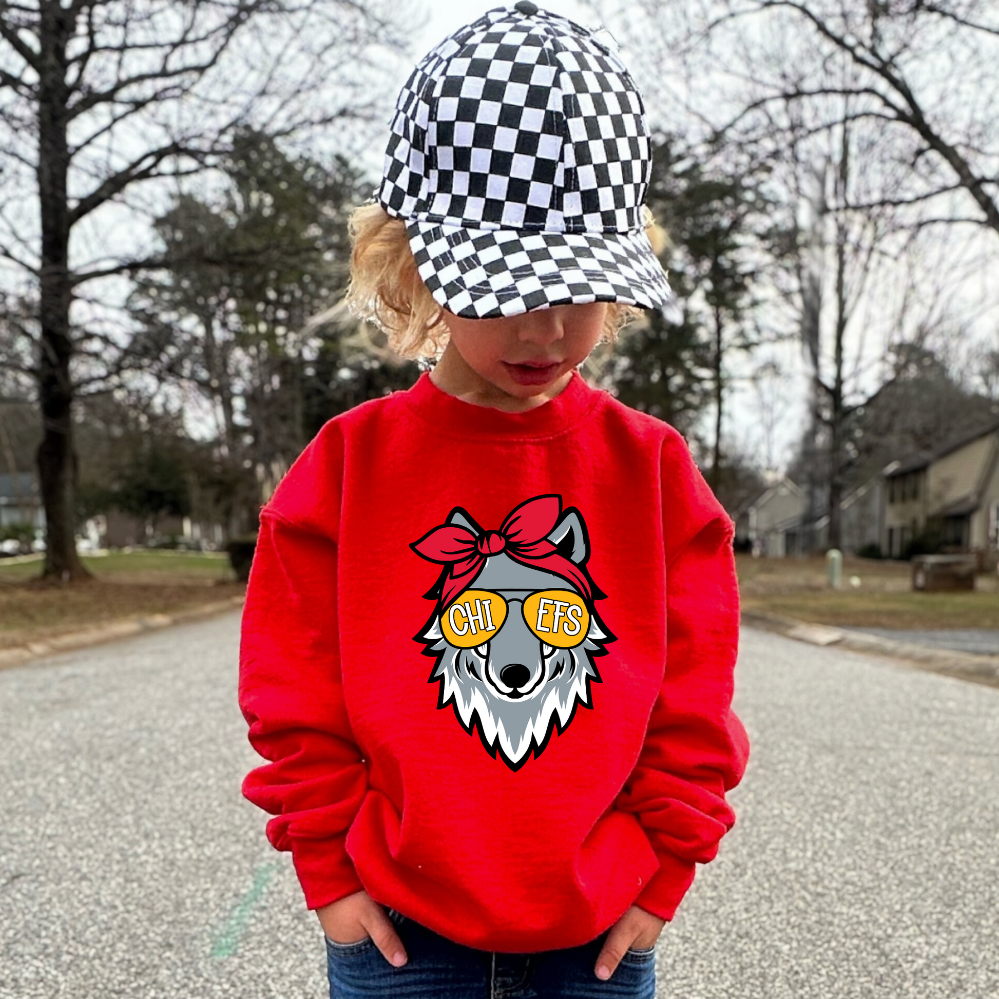 Youth Red sweatshirt with Wolf Girl Kansas City mascot graphic.